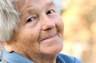 elderly woman smiles